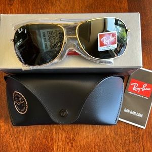 Men’s Arista dark green genuine Ray Ban sunglasses.